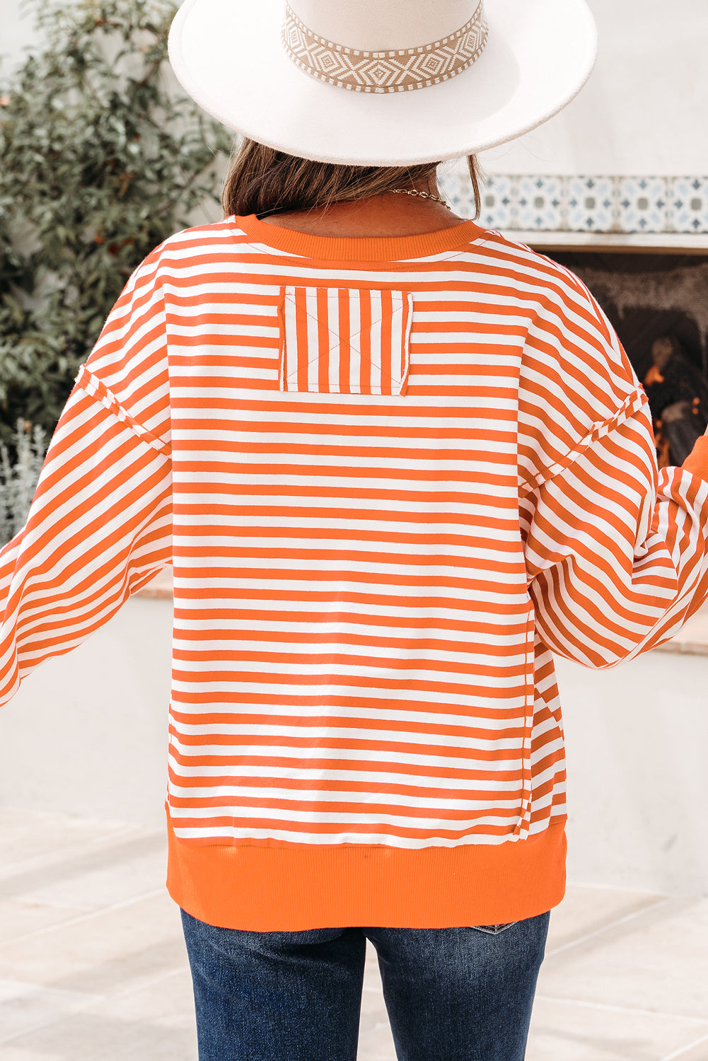 Orange Stripe Exposed Seam Drop Shoulder Casual Pullover Top